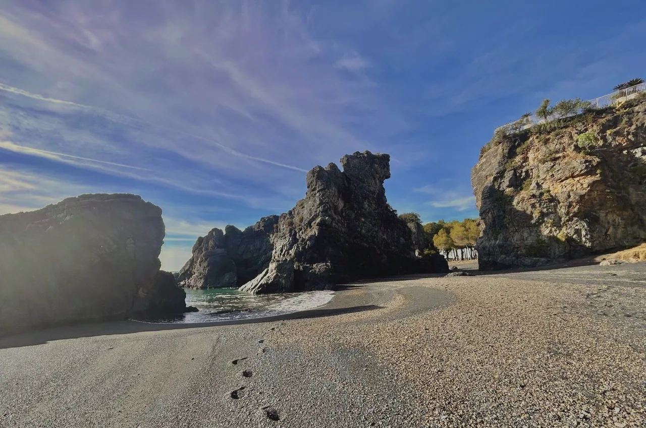 Cliffs above an empty morning beach