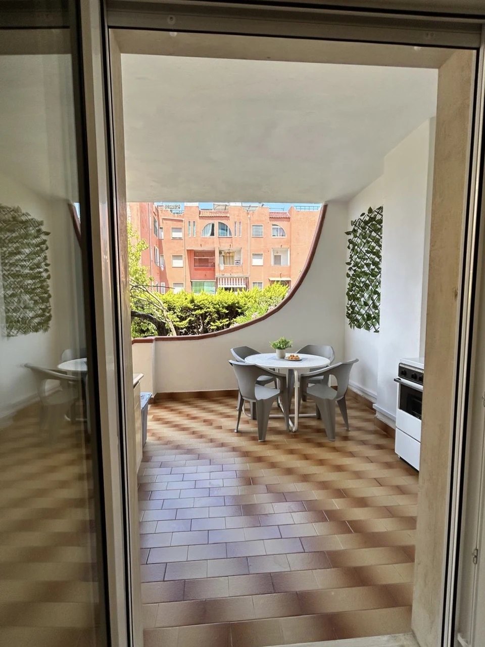 The terrace seen from the living room through the door